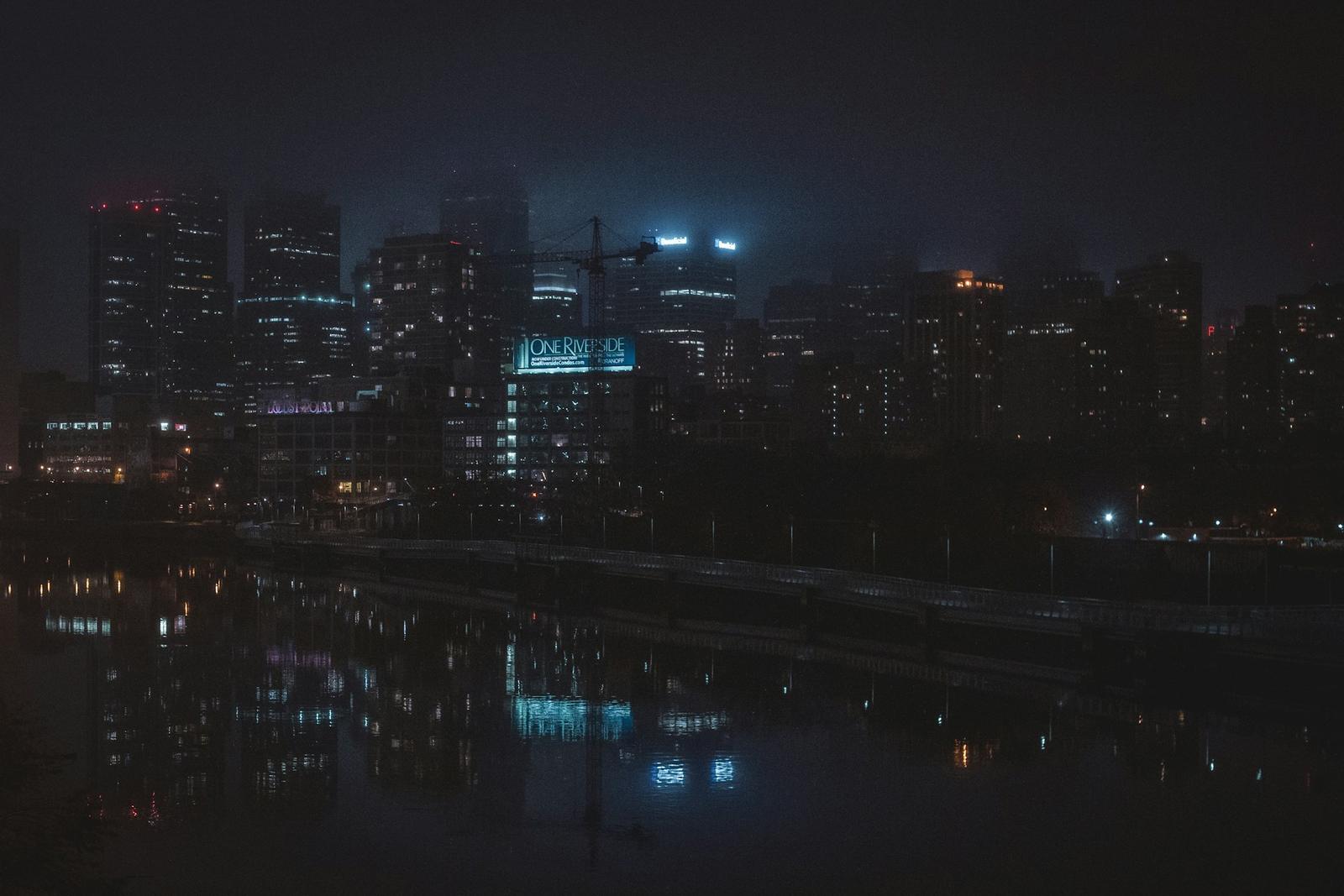 Philadelphia skyline over the river at night