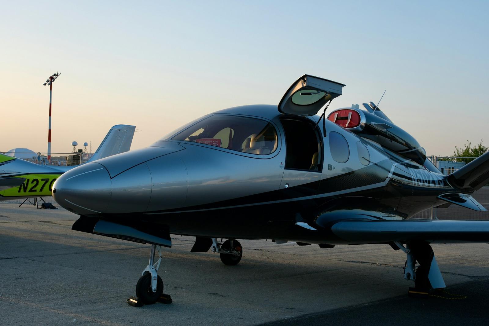 Private jet on the tarmac at dusk
